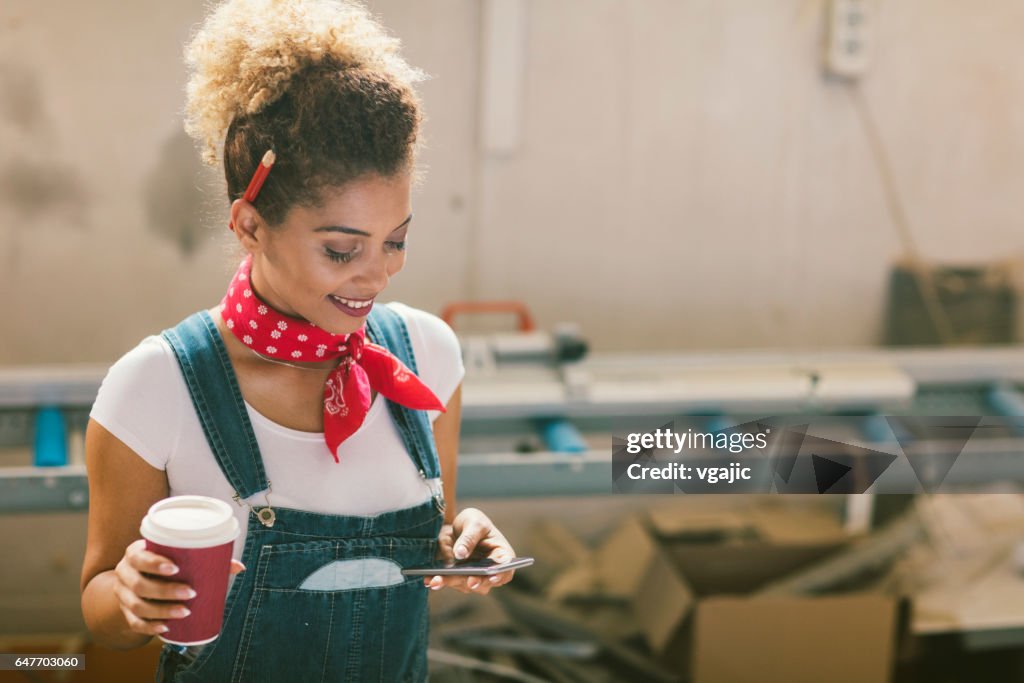 Latina Carpenter In Her Workshop