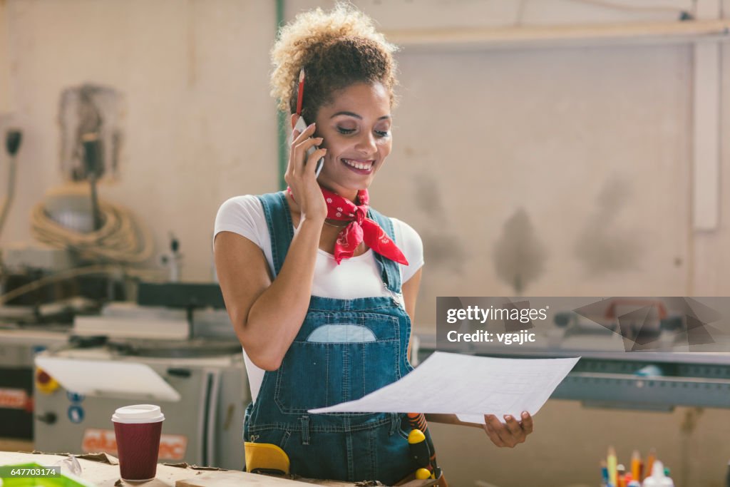 Latina Carpenter In Her Workshop