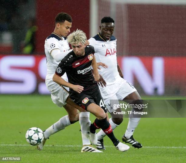 Kevin Kampl of Leverkusen and Dele Alli of Tottenham and Danny Rose of Tottenham battle for the ball during the UEFA Champions League group E soccer...