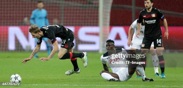 Victor Wanyama of Tottenham and Stefan Kießling of Leverkusen and Admir Mehmedi of Leverkusen battle for the ball during the UEFA Champions League...