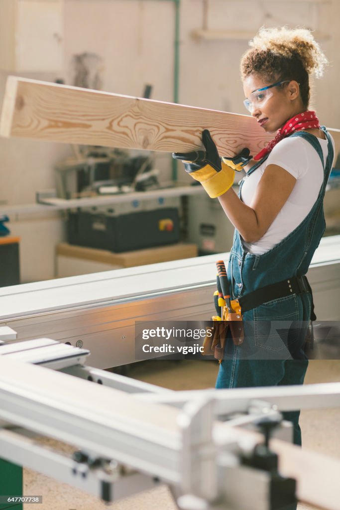 Latina Carpenter In Her Workshop