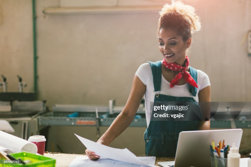 Latina Carpenter In Her Workshop