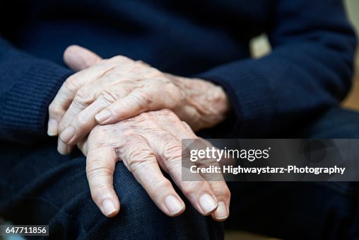 Close Up Of Senior Man Suffering With Parkinsons Diesease Close Up Of Senior Man Suffering With Parkinsons Diesease