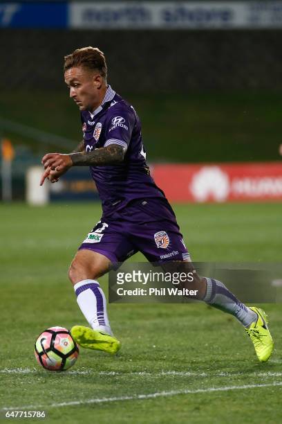 Adam Taggart of Perth takes the ball forward during the round 22 A-League match between the Wellington Phoenix and the Perth Glory at QBE Stadium on...