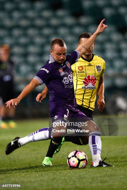 Marc Warren of Perth kicks the ball during the round 22 A-League match between the Wellington Phoenix and the Perth Glory at QBE Stadium on March 4,...