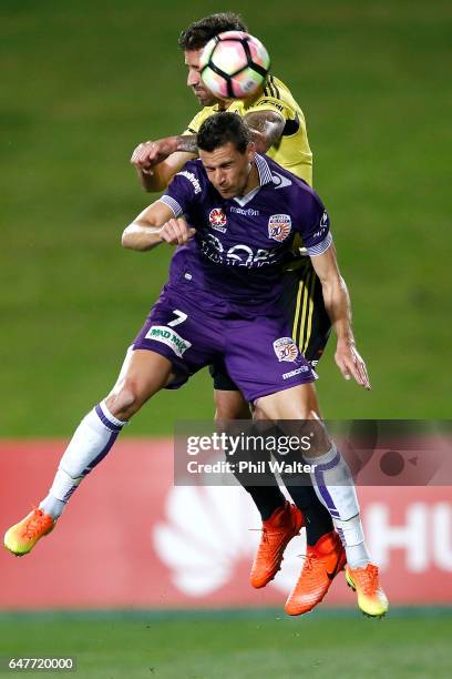 Joel Chianese of Perth and Thomas Doyle of Wellington header the ball during the round 22 A-League match between the Wellington Phoenix and the Perth...