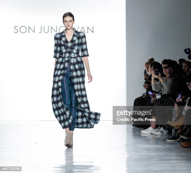 Model walks runway for Son Jung Wan Fall/Winter 2017 collection runway show during New York Fashion Week at Skylight Clarkson Sq., Manhattan.