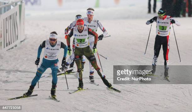 Francois Braud , Johannes Rydzek , Akito Watabe , compete in the Men's Nordic Combined HS130 Ski Jumping / 2 x 7.5km Team Sprint Cross Country during...