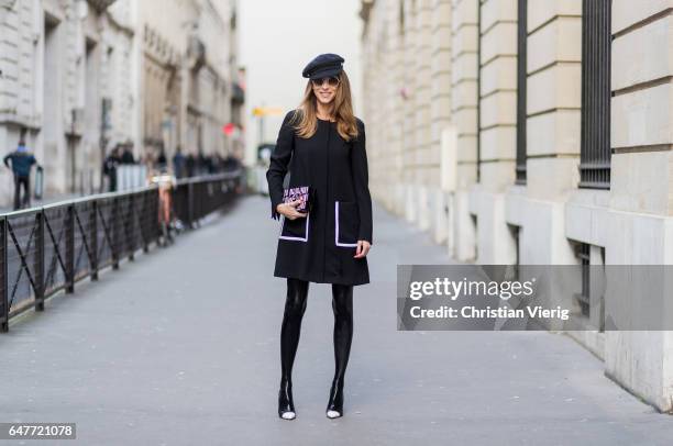 Alexandra Lapp wearing Couture Latex socks - Atsuko Kudo, coat - Steffen Schraut Pumps - Saint Laurent, Cap - Chanel, Bag - Chanel Lego Brique bag in...
