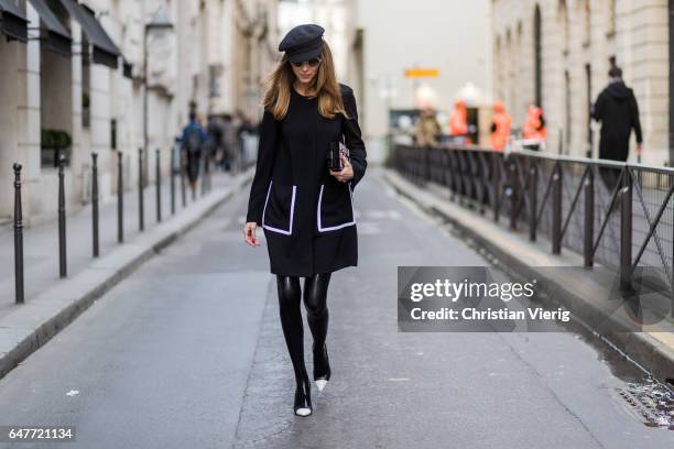 Alexandra Lapp wearing Couture Latex socks - Atsuko Kudo, coat - Steffen Schraut Pumps - Saint Laurent, Cap - Chanel, Bag - Chanel Lego Brique bag in...