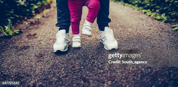 first steps - sporting footwear stock pictures, royalty-free photos & images
