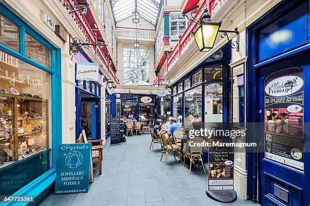 cardiff city centre, view of the castle arcade - cardiff castle stock pictures, royalty-free photos & images