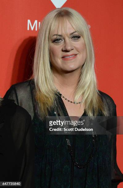Musician Debbi Peterson of The Bangles attends the 2017 MusiCares Person of the Year pre-show arrival red carpet on February 10, 2017 in Los Angeles,...