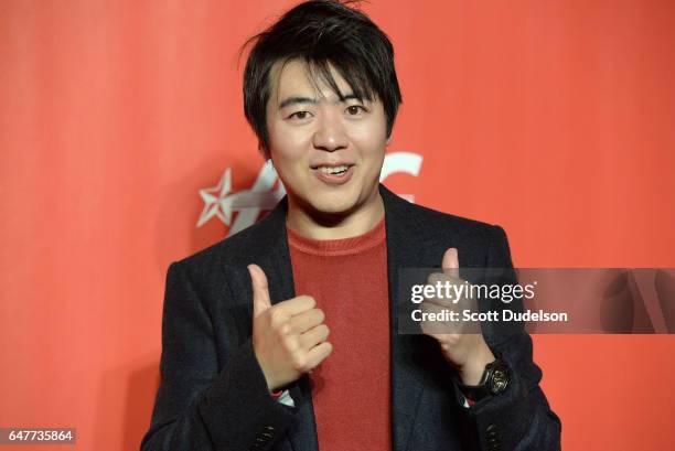 Musician Lang Lang attends the 2017 MusiCares Person of the Year pre-show arrival red carpet on February 10, 2017 in Los Angeles, California.