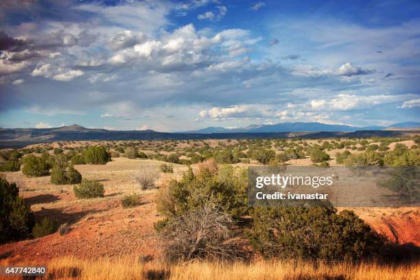 majestic  cloudscape over sandia mountains - albuquerque stock pictures, royalty-free photos & images