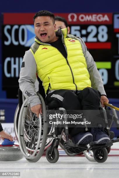 Haitao Wang from China delivers a stone during the World Wheelchair Curling Championship 2017 - test event for PyeongChang 2018 Winter Olympic Games...