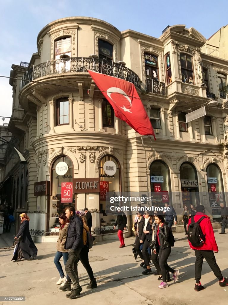 Turkish people walking in the Istiklal Street