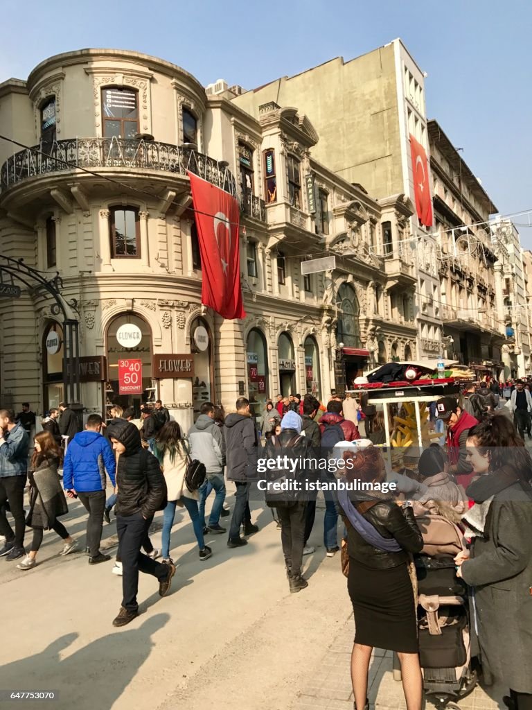 Turkish people walking in the Istiklal Street