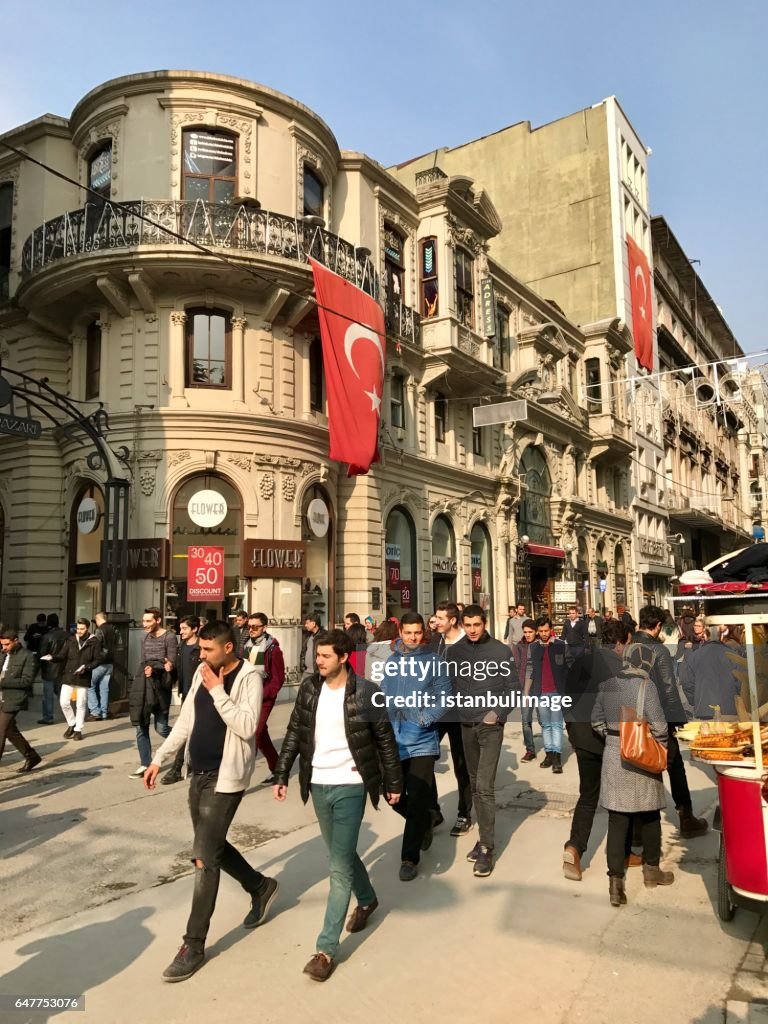 Turkish people walking in the Istiklal Street