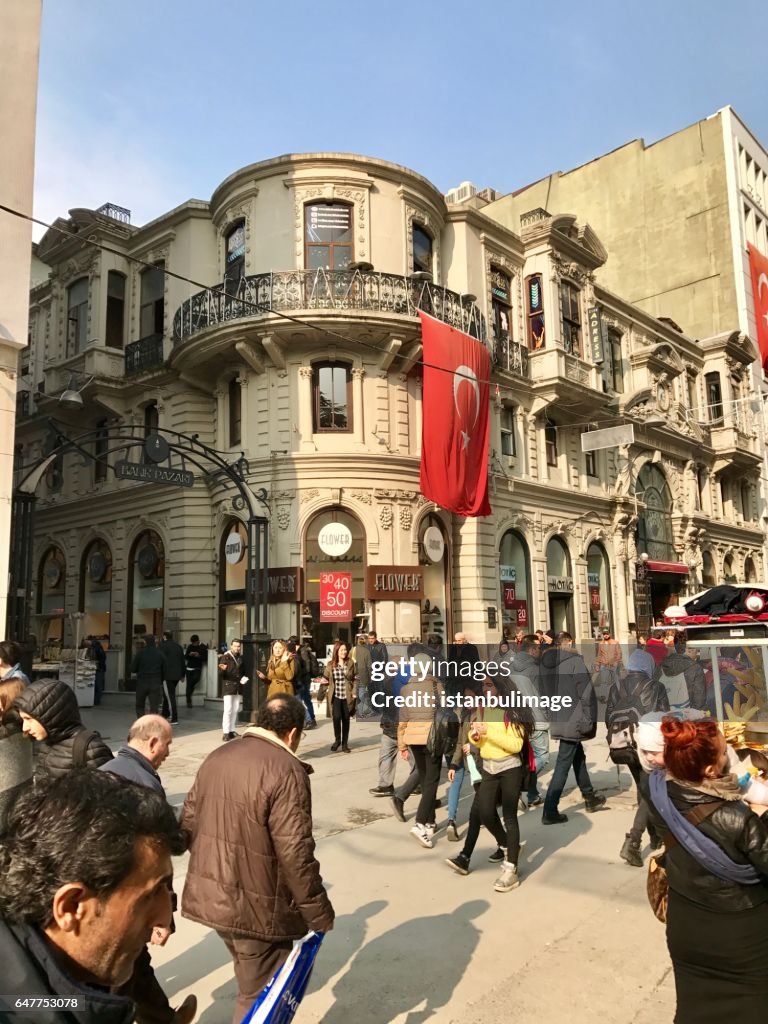 Turkish people walking in the Istiklal Street