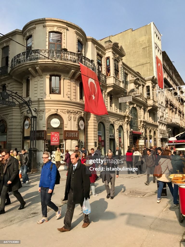 Turkish people walking in the Istiklal Street