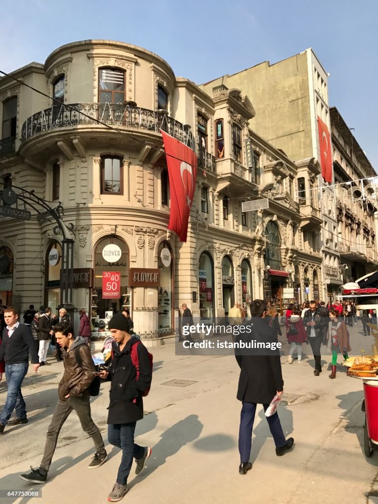 Turkish people walking in the Istiklal Street