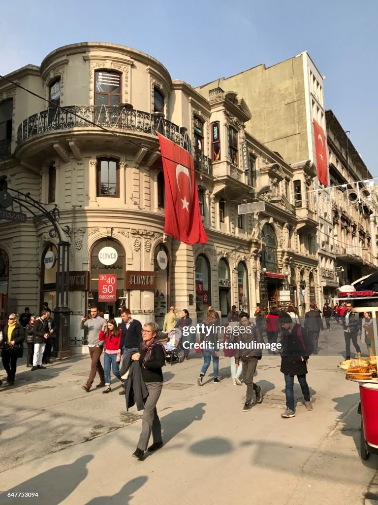 Turkish people walking in the Istiklal Street