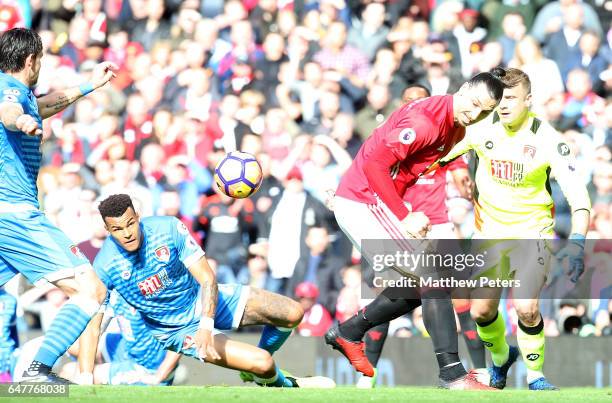 Zlatan Ibrahimovic of Manchester United in action with Tyrone Mings of AFC Bournemouth during the Premier League match between Manchester United and...