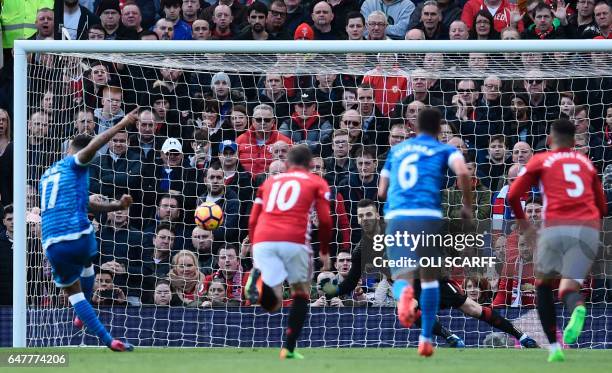 Bournemouth's Norwegian striker Joshua King scores their first goal from the penalty spot during the English Premier League football match between...