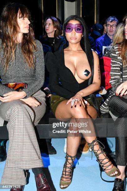 Caroline de Maigret and Nicki Minaj attends the Haider Ackermann show as part of the Paris Fashion Week Womenswear Fall/Winter 2017/2018 on March 4,...