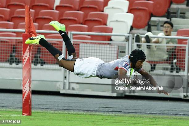 Malcolm Adrian Emile Jaer of Kings dives to score a try during the round two Super Rugby match between the Sunwolves and the Kings at Singapore...