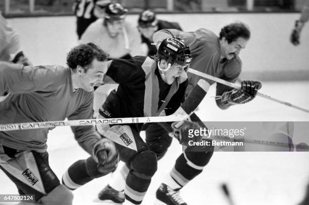 Vancouver’s Tiger Willliams , Stan Smyl , and Harold Snepsts lead the way during a spirited sprint drill during practice 5/10 at Nassau Coliseum. The...