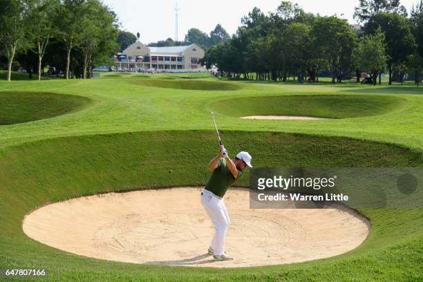Mikko Korhonen of Finland plays out of an 18th fairway bunker during the third round of the Tshwane Open at Pretoria Country Club on March 4, 2017 in...