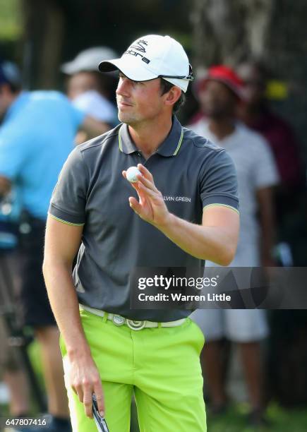 Alexander Bjork of Sweden acknowledges the crowd on the18th green during the third round of the Tshwane Open at Pretoria Country Club on March 4,...