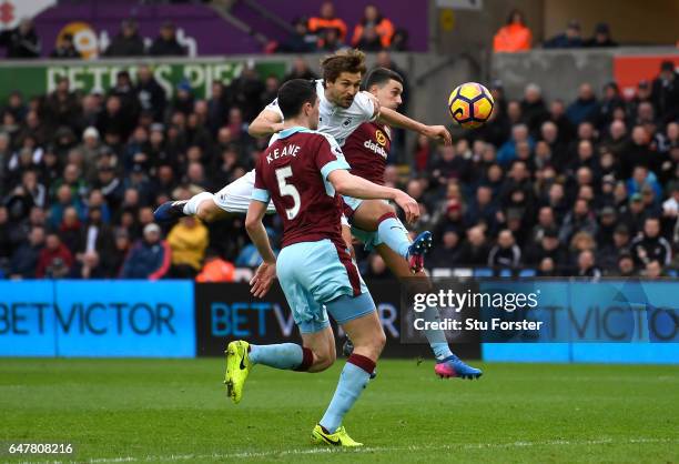 Fernando Llorente of Swansea City scores his sides first goal during the Premier League match between Swansea City and Burnley at Liberty Stadium on...