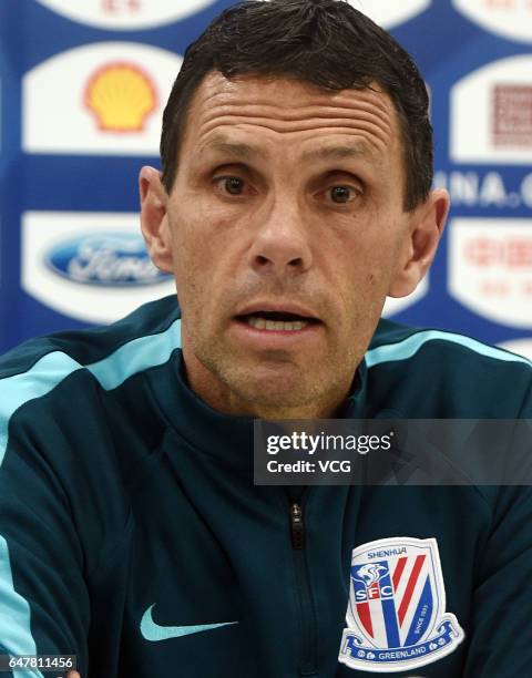 Gustavo Poyet, head coach of Shanghai Shenhua, attends the press conference ahead of Chinese Super League between Jiangsu Suning and Shanghai Shenhua...