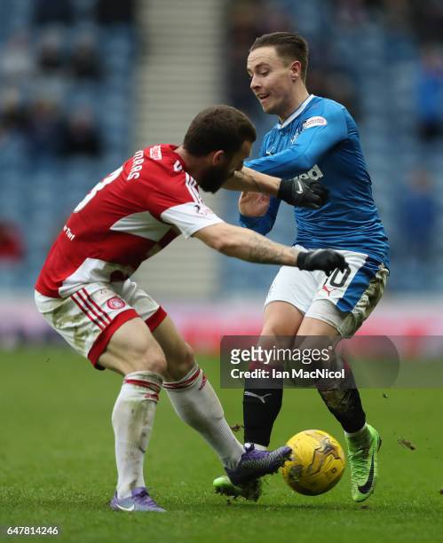 Giannis Skondras of Hamilton Academical vies with Harry Forrester of Rangers during the Scottish Cup Quarter final match between Rangers and Hamilton...