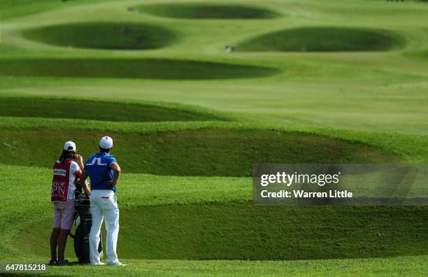 Jamie Donaldson of Wales prepares to play his second shot into the 18th green during the third round of the Tshwane Open at Pretoria Country Club on...