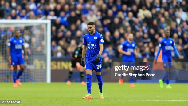 Riyad Mahrez of Leicester City is dejected after Hull City score their first goal of the game during the Premier League match between Leicester City...