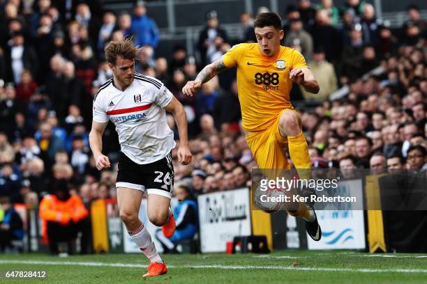 Jordan Hugill of Preston North End holds off the challenge of Tomas Kalas of Fulham during the Sky Bet Championship match between Fulham and Preston...