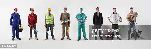 line up of different occupations - protective workwear stock pictures, royalty-free photos & images