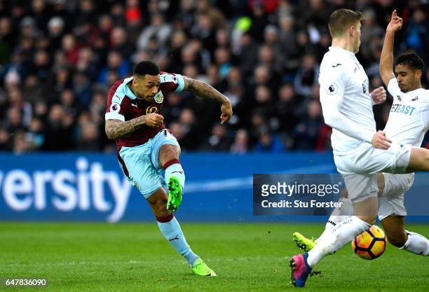 Andre Gray of Burnley scores his sides second goal during the Premier League match between Swansea City and Burnley at Liberty Stadium on March 4,...