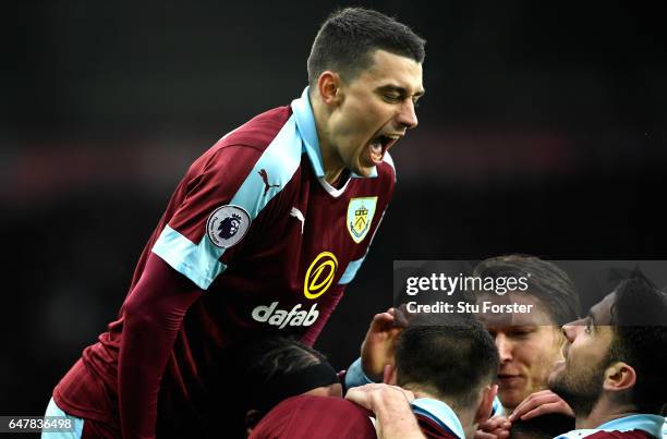 Matthew Lowton of Burnley celebrates his side second goal during the Premier League match between Swansea City and Burnley at Liberty Stadium on...