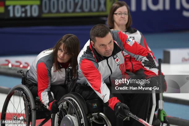 Mark Ideson from Canada delivers a stone during the World Wheelchair Curling Championship 2017 - test event for PyeongChang 2018 Winter Olympic Games...