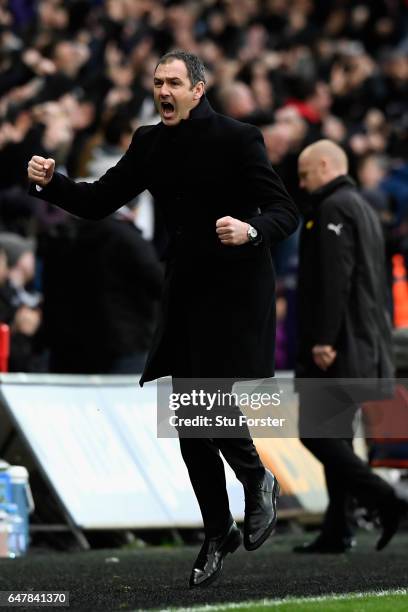 Paul Clement, Manager of Swansea City celebrates his side second goal during the Premier League match between Swansea City and Burnley at Liberty...