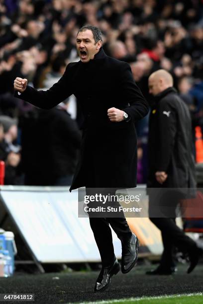 Paul Clement, Manager of Swansea City celebrates his sides second goal during the Premier League match between Swansea City and Burnley at Liberty...