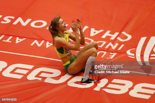 Airine Palsyte of Lithuania celebrates after winning the gold medal in the Women's High Jump final on day two of the 2017 European Athletics Indoor...