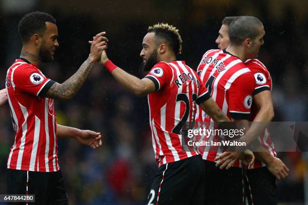 Nathan Redmond of Southampton celebrates scoring his sides third goal with Ryan Bertrand of Southampton during the Premier League match between...