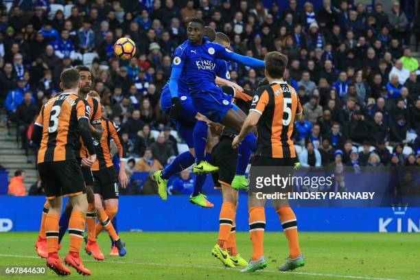 Leicester City's Nigerian midfielder Wilfred Ndidi scores with this header to make the score 3-1 during the English Premier League football match...