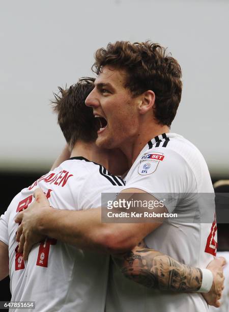 Chris Martin of Fulham celebrates scoring his sides second goal with team mate Stefan Johansen during the Sky Bet Championship match between Fulham...